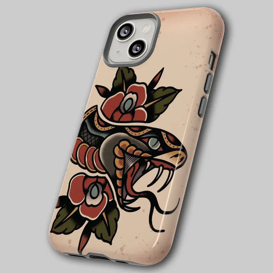 Angled view of vintage tattoo phone case showing dual-layer shell.