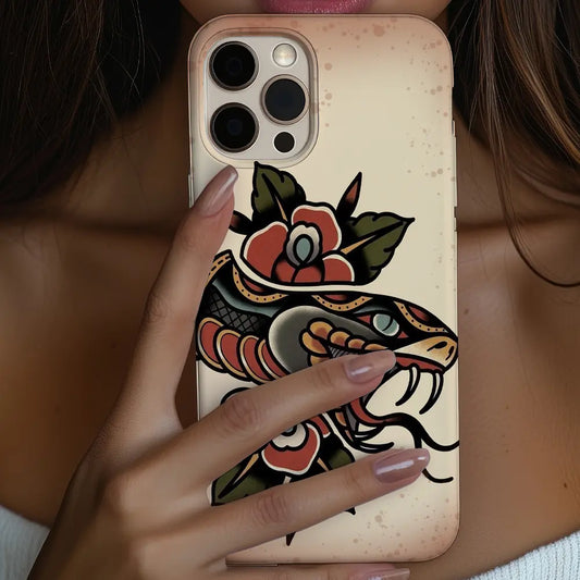 In-hand view of MagSafe Traditional Snake Flash case ready for wireless charging.