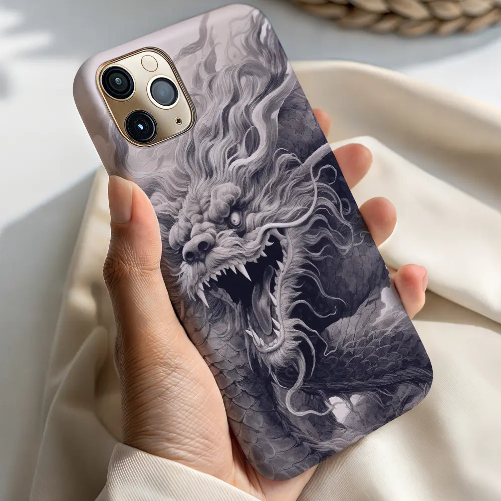 In-hand view of Chinese Dragon Ink case highlighting the scale texture.