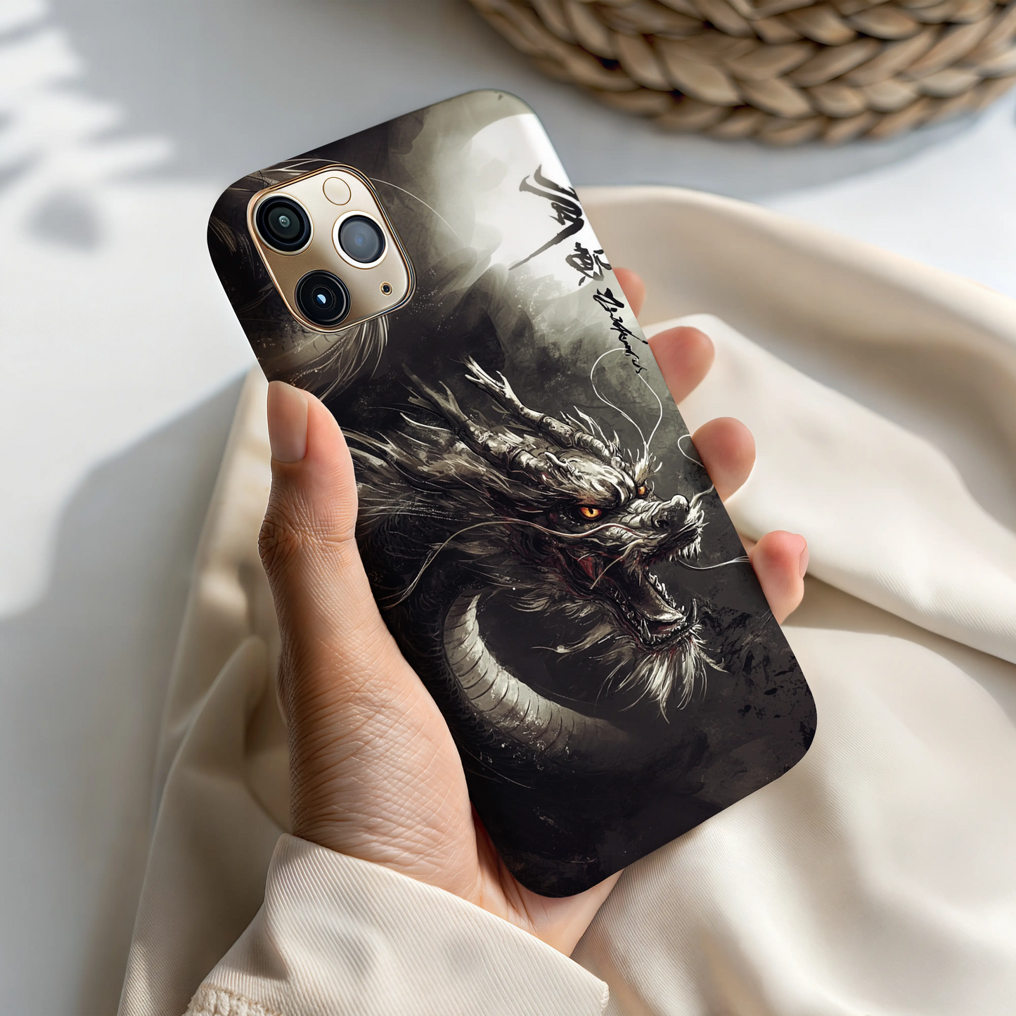 In-hand view of MagSafe dragon case ready for wireless charging.