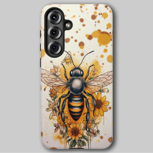 Golden Garden Bee tough phone case with warm golden floral cottage core artwork against soft grey background.