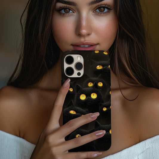 Hallo-Kitty phone case in hand, lifestyle view highlighting subtle gothic aesthetic