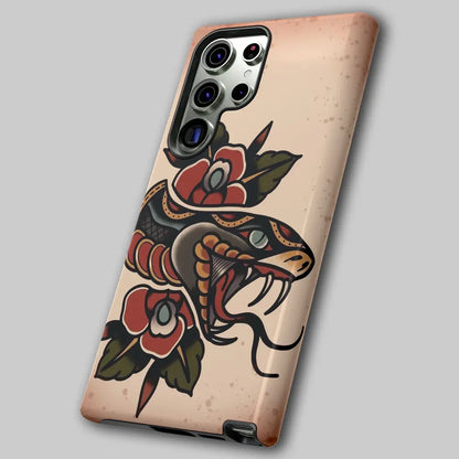 Angled view of vintage tattoo phone case showing dual-layer shell.